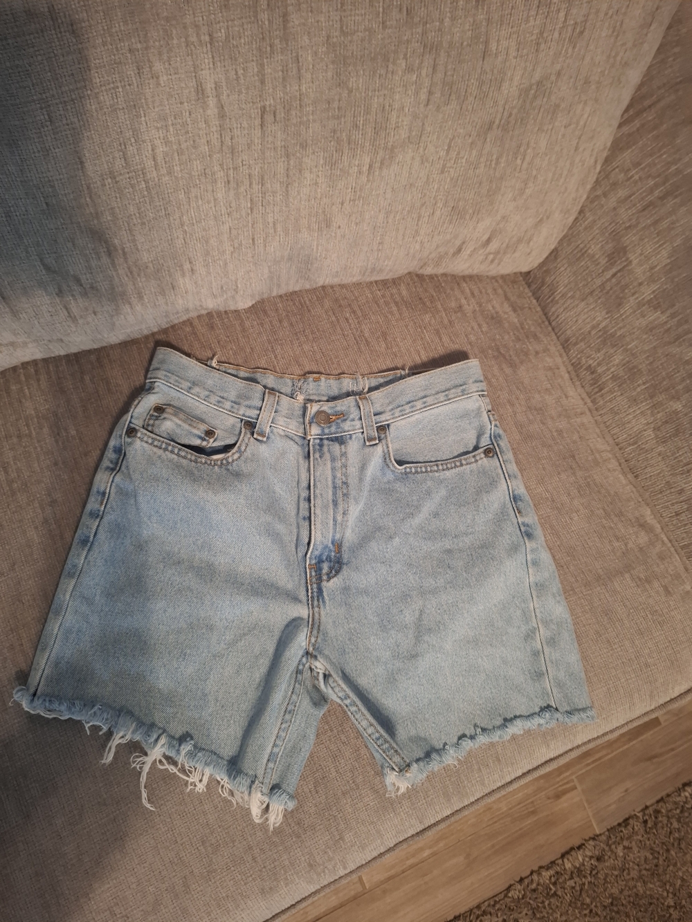 High-Rise Light Blue Denim Shorts with Frayed Hem